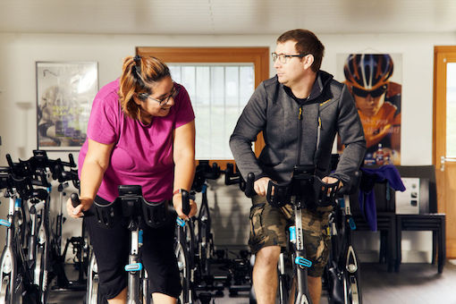 510px-Switzerland Group Spin Two people using exercise bikes